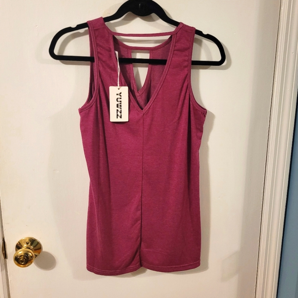 Red tank top.  Small. Fits like a medium